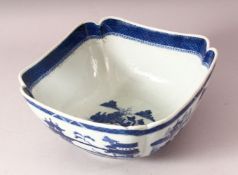 AN 18TH CENTURY CHINESE BLUE & WHITE PORCELAIN BOWL - decorated with landscapes, 25cm.