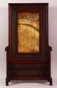 A CHINESE HARDSTONE AND CARVED WOOD TABLE SCREEN, the hardstone panel framed in a carved wooden