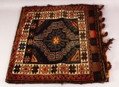 AN ISLAMIC SADDLE BAG, 63cm x 65cm.