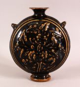 A SMALL JIZHOU KILN POTTERY MOON VASE, 21cm high, 18cm wide.