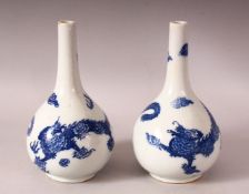 A PAIR OF 19TH / 20TH CENTURY CHINESE BLUE & WHITE PORCELAIN VASES - each decorated with scenes of a