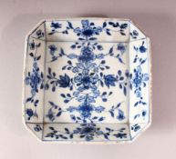 AN 18TH CENTURY CHINESE BLUE & WHITE FLORAL DISH - decorated with native flora, 14cm