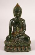 A THAI CARVED GREEN HARDSTONE BUDDHA, 13cm high.
