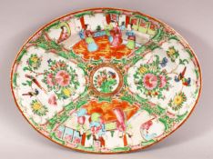 A 19TH CENTURY CHINESE CANTON FAMILLE ROSE PORCELAIN DISH - with panel decoration of figures, flora,