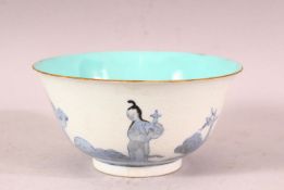 A CHINESE BLUE, WHITE AND TURQUOISE PORCELAIN TEA BOWL, the sides with incised scale ground and