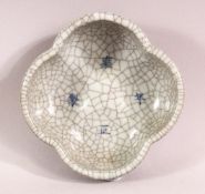 A CHINESE GE STYLE CRACKLE GLAZED PORCELAIN BUSH WASH, with a four character blue mark interior,