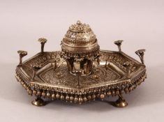 A FINE 19TH CENTURY INDIAN SILVER OCTAGONAL SHAPED SPICE BOX AND STAND, with double hinged cover and