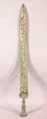A CHINESE ARCHAIC STYLE BRONZE SWORD, the blade incised with calligraphy and border decoration in