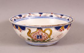 AN 18TH CENTURY TURKISH KUTHAYA POTTERY SOUP BOWL - decorated with vessels, 15.5cm