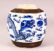 A 19TH CENTURY CHINESE BLUE & WHITE PORCELAIN DRAGON JAR - depicting twin dragons chasing the pearl,