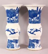 A PAIR OF CHINESE BLUE & WHITE PORCELAIN VASES, Decorated with kylin and landscapes, with a six