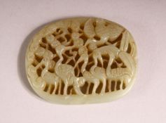 A CHINESE CARVED GREEN JADE PENDANT OF CRANE - carved in openwork with crane and foliage, 6.2cm
