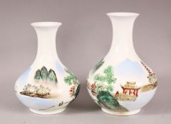 A PAIR OF CHINESE EGGSHELL VASES, one slightly taller than the other, 14cm and 13cm.