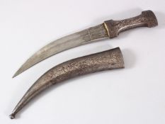 A 19TH CENTURY PERSIAN QAJAR SILVER INLAID STEEL DAGGER with engraved watered steel blade, 35cm