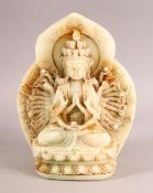 A LARGE CHINESE CARVED JADE FIGURE OF THOUSAND ARM GUANYIN DEITY, seated upon a lotus base with