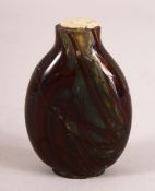 A CHINESE HARDSTONE / GLASS SNUFF BOTTLE - with varied colour decoration, 6cm