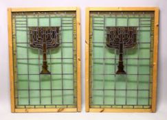 A PAIR OF JEWISH THEME STAIN GLASS WINDOWS - each with a central stained glass centre depicting a