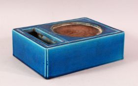 A CHINESE TURQUIOSE GLAZED INK STONE, containing brush pot / brush wash, the base bearing a six