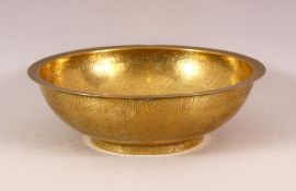 A FINE 18TH/19TH CENTURY ISLAMIC PERSIAN BRASS MAGIC BOWL, typically engraved with calligraphy, 21.
