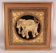 A LARGE INDIAN EMROIDERED AND BEADED PANEL, the centre with large roundel containing an elephant,