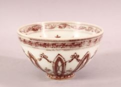 A RED AND WHITE PORCELAIN TEA BOWL, 9cm diameter.