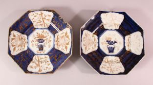 A PAIR OF JAPANESE MEIJI PERIOD BLUE & WHITE ARITA PORCELAIN OCTAGONAL PLATES / DISHES - each with a