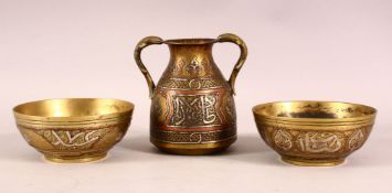 A 19TH CENTURY CAIROWARE TRIO - comprising two small inlaid bowls and an inlaid twin handle