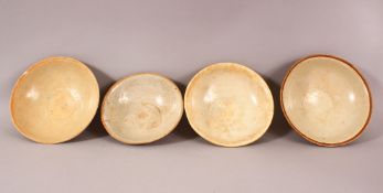 A MIXED LOT OF 4 EARLY CHINESE POTTERY BOWLS - Varying glaze types & sizes -largest from 16cm