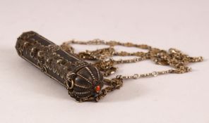 A SILVER AND CORAL BEAD SCROLL VESSEL, the vessel with a coral bead at each end and chain,