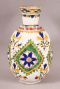 A TURKISH KUTHAYA POTTERY VASE - with floral motif panel decoration - 17.5cm