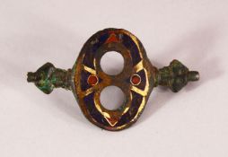 A RARE BYZANTINE OR POSSIBLY VIKING ENAMELLED BRONZE BELT BUCKLE, 6cm x 3.5cm.