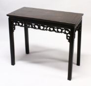 A LATE 19TH / EARLY 20TH CENTURY CHINESE HARDWOOD RECTANGULAR TABLE, with entwined carved and