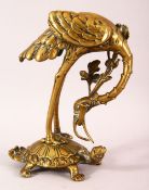 A JAPANESE MEIJI PERIOD BRONZE FIGURE OF A CRANE & TORTOISE - The egret in a leaned pose aside flora