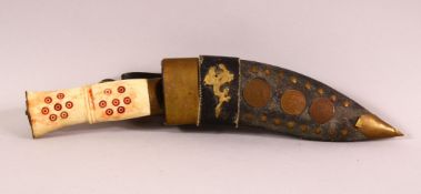 AN EASTERN CARVED BONE HANDLED DAGGER & LEATHER SHEATH, The bone handle carved and stained, the