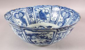A GOOD LARGE CHINESE WANLI BLUE & WHITE PORCELAIN BOWL - with decoration in panels of flora and