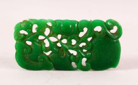 A CHINESE EMERALD COLOUR JADEITE CARVING, the carving depicting fruits, mushroom and vines, 10.5cm x