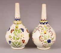 A PAIR OF 18TH CENTURY TURISH KUTAHYA POTTERY VASES - each decorated with floral motif pattern,