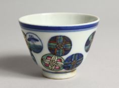 A SMALL CHINESE PORCELAIN RICE BOWL 2.75ins diameter.