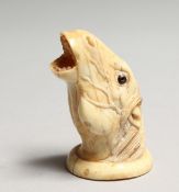 A CARVED BONE HORSE'S HEAD 2.25ins