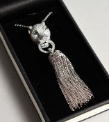 A SILVER PANTHER'S HEAD AND TASSLE NECKLACE