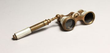 A PAIR OF IVORY, MOTHER OF PEARL AND GILT OPERA GLASSES with handle Chendlier, Paris..
