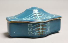 A SMALL ART NOUVEAU PORCELAIN BOX AND COVER, the blue ground with moulded stylised decoration 5.