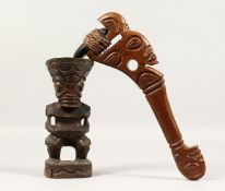 TWO MARQUISE ITEMS, FIGURE, 8ins high and CLUB, 12ins long (3).