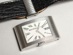 A GOOD BOUCHERON WRIST WATCH with leather strap. No. 090 - 6233