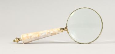 A MAGNIFYING GLASS WITH MOTHER OF PEARL HANDLE.