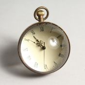 A GLASS BALL WATCH 2.25ins diameter.