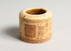 AN ARCHER'S RING with caligraphy