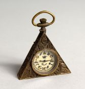 A TRIANGULAR MASONIC TRAVELLING WATCH 2ins