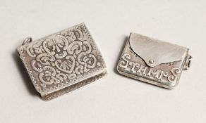 TWO NOVELTY SILVER STAMP CASES