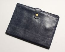 AN ASPREY BLACK LEATHER PASSPORT HOLDER used 7 ins wide